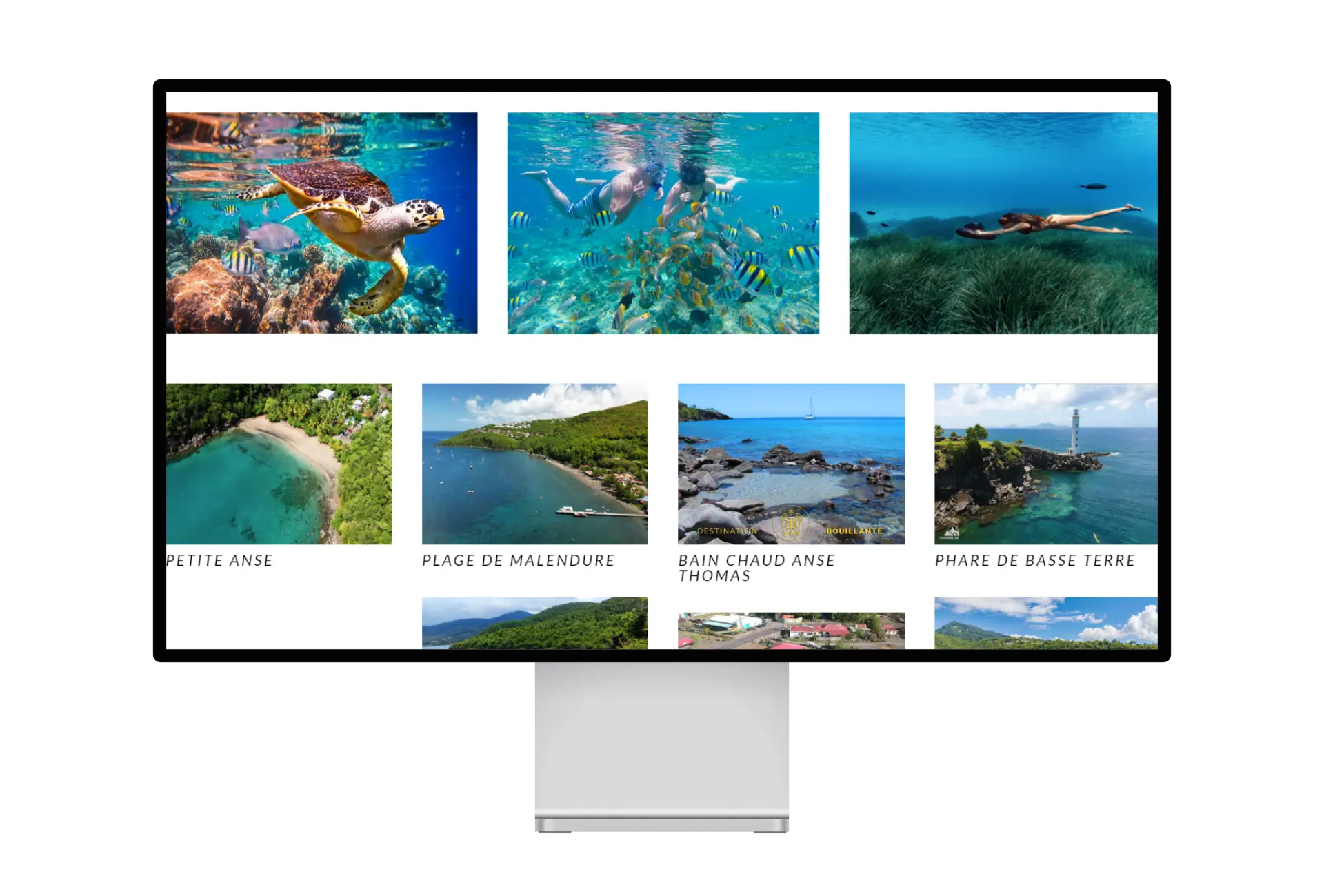 Galerie de Caraibes Gliss présentant les fonds marins et les paysages de Guadeloupe